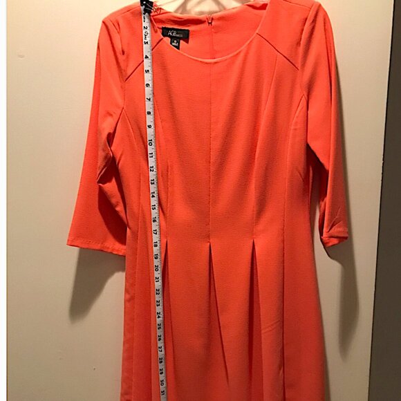 AGB Dresses & Skirts - AGB Peach fit & flare dress with soft pleats size 10. Knee length has 3/4 sleeve